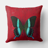 赤い壁の黒くおよび青の蝶 クッション (裏面)