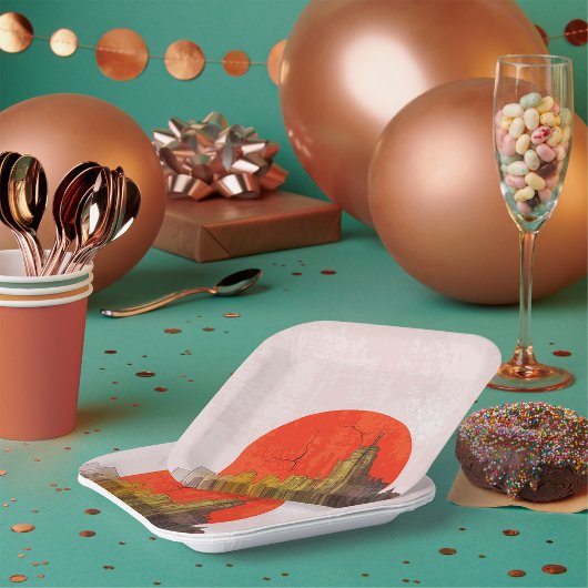 赤い太陽の街並みがある都市グランジスカイライン ペーパープレート