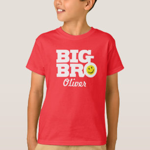 赤い子供のTシャツに大きなブランドの白 Tシャツ