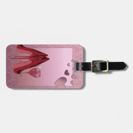 赤い小剣およびピンクのハート ラゲッジタグ