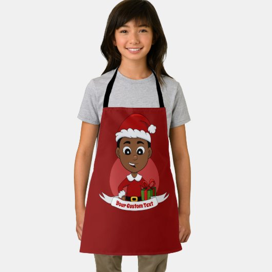 赤い帽子のエプロンを持つクリスマスの少年 エプロン (インサイチュ)