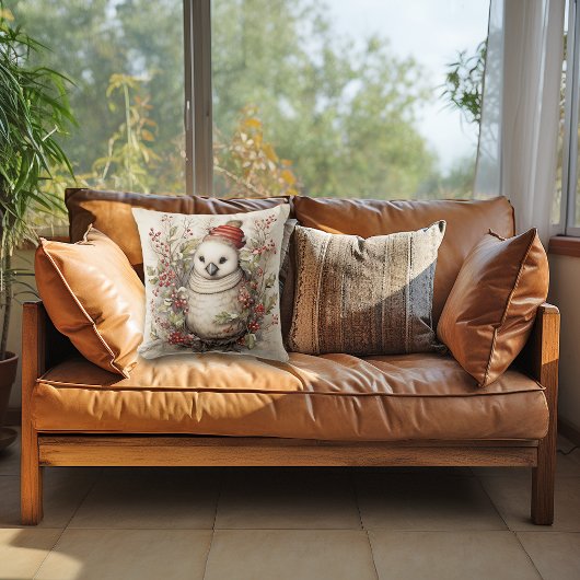 赤い帽子をかぶったかわいい白いクリスマスの鳥 クッション