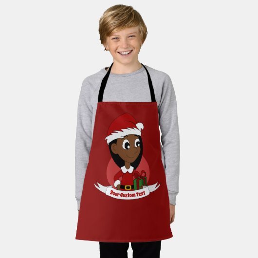 赤い帽子をかぶった可愛いクリスマスガール – 漫画 エプロン (着用した状態)