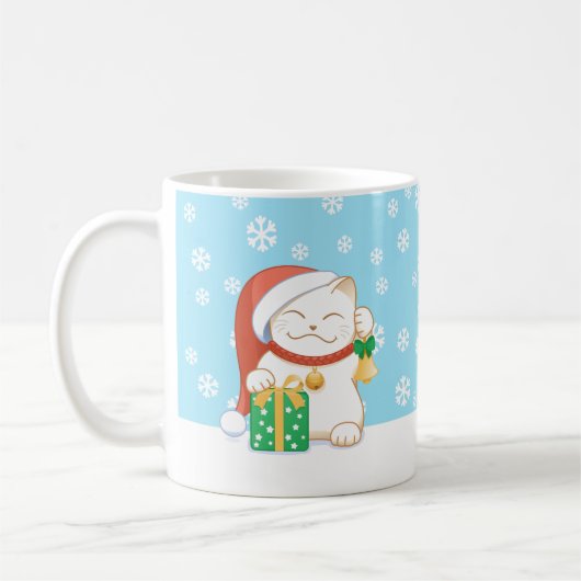 赤い帽子をかぶった白いクリスマス猫 コーヒーマグカップ (左)