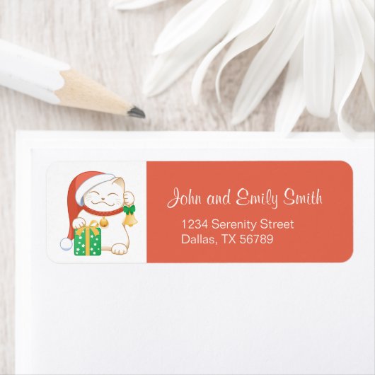 赤い帽子をかぶった白いクリスマス猫 ラベル (インサイチュ)