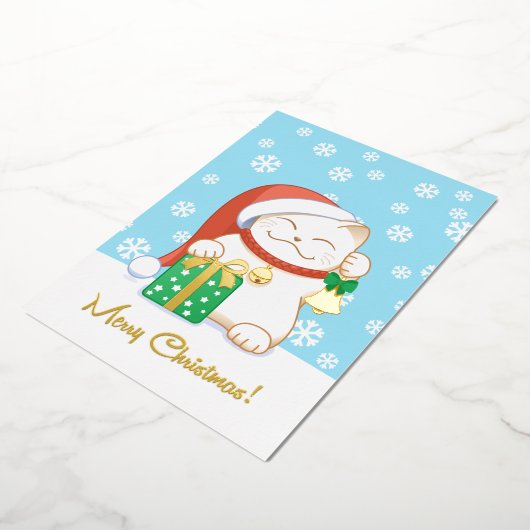 赤い帽子をかぶった白いクリスマス猫 箔シーズンカード (回転した状態)