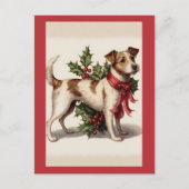 赤い弓とホリーを持つヴィンテージクリスマスドッグ ポストカード (正面)