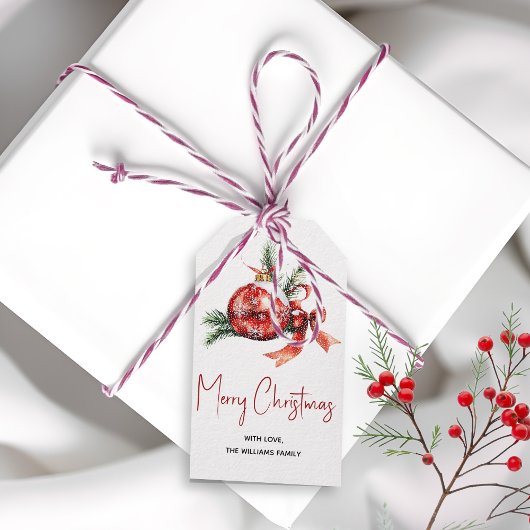 赤い弓とモミの枝を持つクリスマスオーナメント ギフトタグ