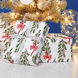 赤い弓のクリスマスを持つ大きな緑のホリーガーランド ラッピングペーパー