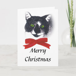 赤い弓のクリスマスカードを持つタキシード猫 シーズンカード