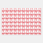 赤い弓のラッピング紙。ギフトラッピング。 ラッピングペーパーシート (正面)