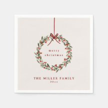 赤い弓を持つクリスマスの葉リース