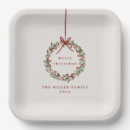 赤い弓を持つクリスマスの葉リース ペーパープレート