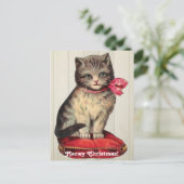 赤い弓を着て座るクリスマスの子猫 インビテーションポストカード (スタンド正面)