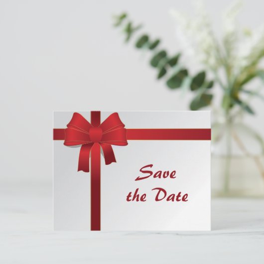 赤い弓冬の結婚式の日付を保存 案内ポストカード (スタンド正面)
