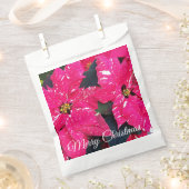 赤い斑点状ポインセティアスクリスマスフローラ フェイバーバッグ (クリップ留めされた状態)