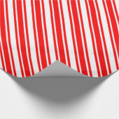 赤い斜めのキャンディ・ケーンは縞で飾ります ラッピングペーパー (角)