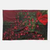 赤い果実を持つクリスマスリース キッチンタオル (横)