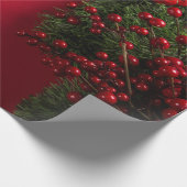 赤い果実を持つクリスマスリース ラッピングペーパー (角)