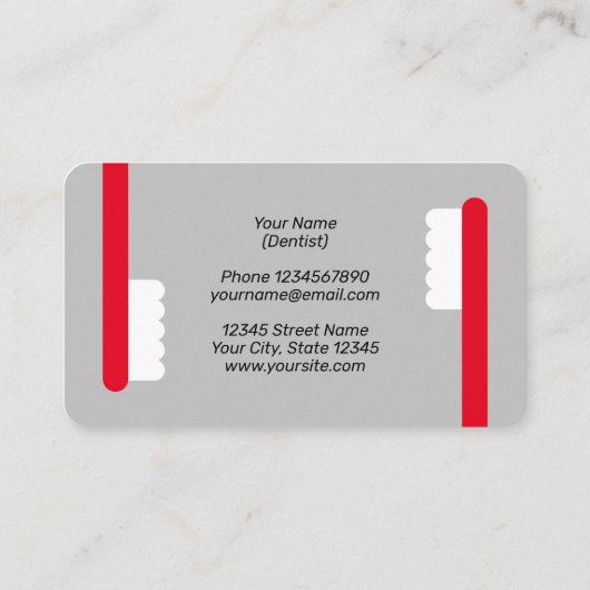 赤い歯ブラシのロゴプロフェッショナル歯科医院 名刺 (裏面)