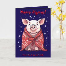 赤い毛布に包まれたクリスマスの豚（ペットとして）