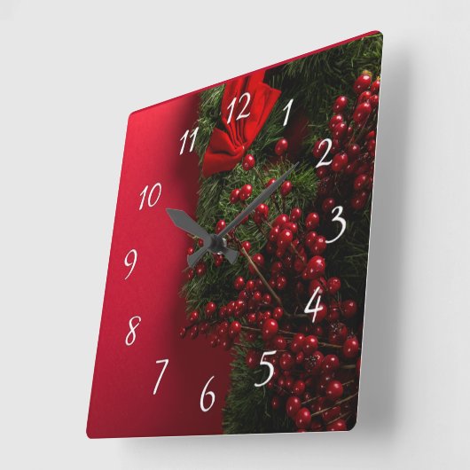 赤い漿果のあるクリスマスリース      スクエア壁時計 (傾斜)