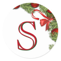 赤い玉飾りの松の葉のクリスマスの封筒のシール