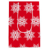 赤い白いスノーフレークのパターン ミディアムペーパーバッグ (裏面)