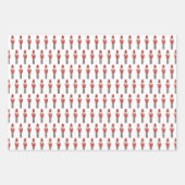 赤い白のくるみ割り器とキャンディーケーンクリスマス ラッピングペーパーシート (正面)