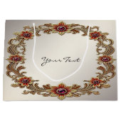 赤い石の付いたゴールドの花模様のフレーム ギフトバッグ (正面)