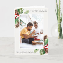 赤い緑のホリーベリーパインコーン新年の写真