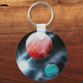 赤い緑の惑星と白い星の拡大 キーホルダー (正面)