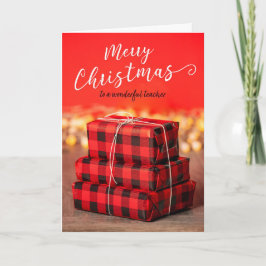 赤い背景にギフトの山 メリークリスマス教師 シーズンカード