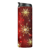 赤い背景にクリスマスゴールデンの雪片 タンブラー (回転右)
