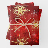 赤い背景にクリスマスゴールデンの雪片 ラッピングペーパーシート (インサイチュ)