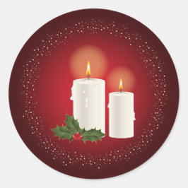 赤い背景にホーリーと白いクリスマスキャンドル ラウンドシール