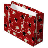 赤い背景に可愛い黒いパーティー模様 ラージペーパーバッグ (正面アングル)