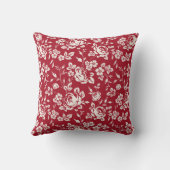 赤い背景に白い花のシルエット。シール クッション (裏面)