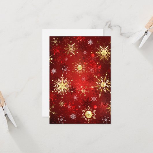 赤い背景に金のクリスマスの雪の結晶 カード (正面/裏面インサイチュ)