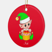 赤い背景のクリスマスエルフ セラミックオーナメント (左)