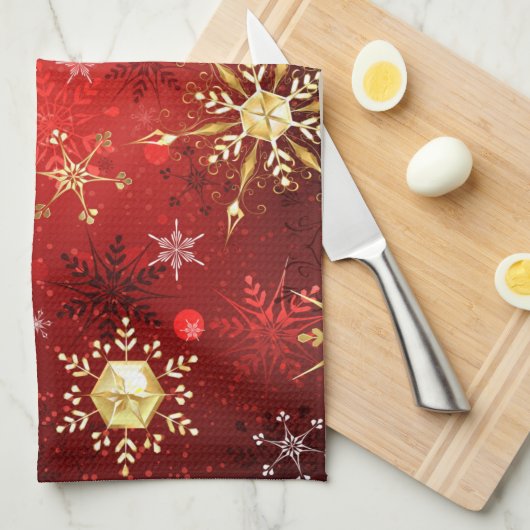 赤い背景のクリスマスゴールデンスノーフレーク キッチンタオル (四つ折り)