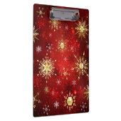 赤い背景のクリスマスゴールデンスノーフレーク クリップボード (右)