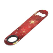赤い背景のクリスマスゴールデンスノーフレーク スピード栓抜き (正面アングル)
