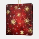 赤い背景のクリスマスゴールデンスノーフレーク セラミックオーナメント (左)