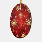 赤い背景のクリスマスゴールデンスノーフレーク セラミックオーナメント (左)