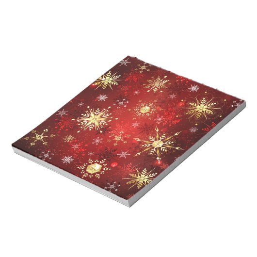 赤い背景のクリスマスゴールデンスノーフレーク ノートパッド (回転)