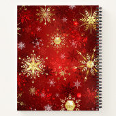 赤い背景のクリスマスゴールデンスノーフレーク ノートブック (裏面)