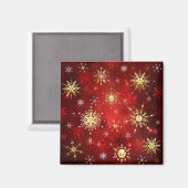 赤い背景のクリスマスゴールデンスノーフレーク マグネット (正面/裏面)