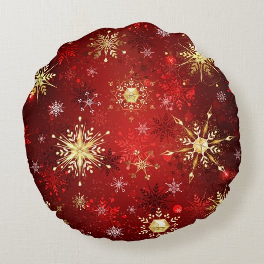 赤い背景のクリスマスゴールデンスノーフレーク ラウンドクッション (裏面)