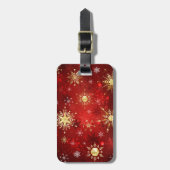 赤い背景のクリスマスゴールデンスノーフレーク ラゲッジタグ (正面縦)